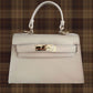 The Janáe Mini Handbag - Beige